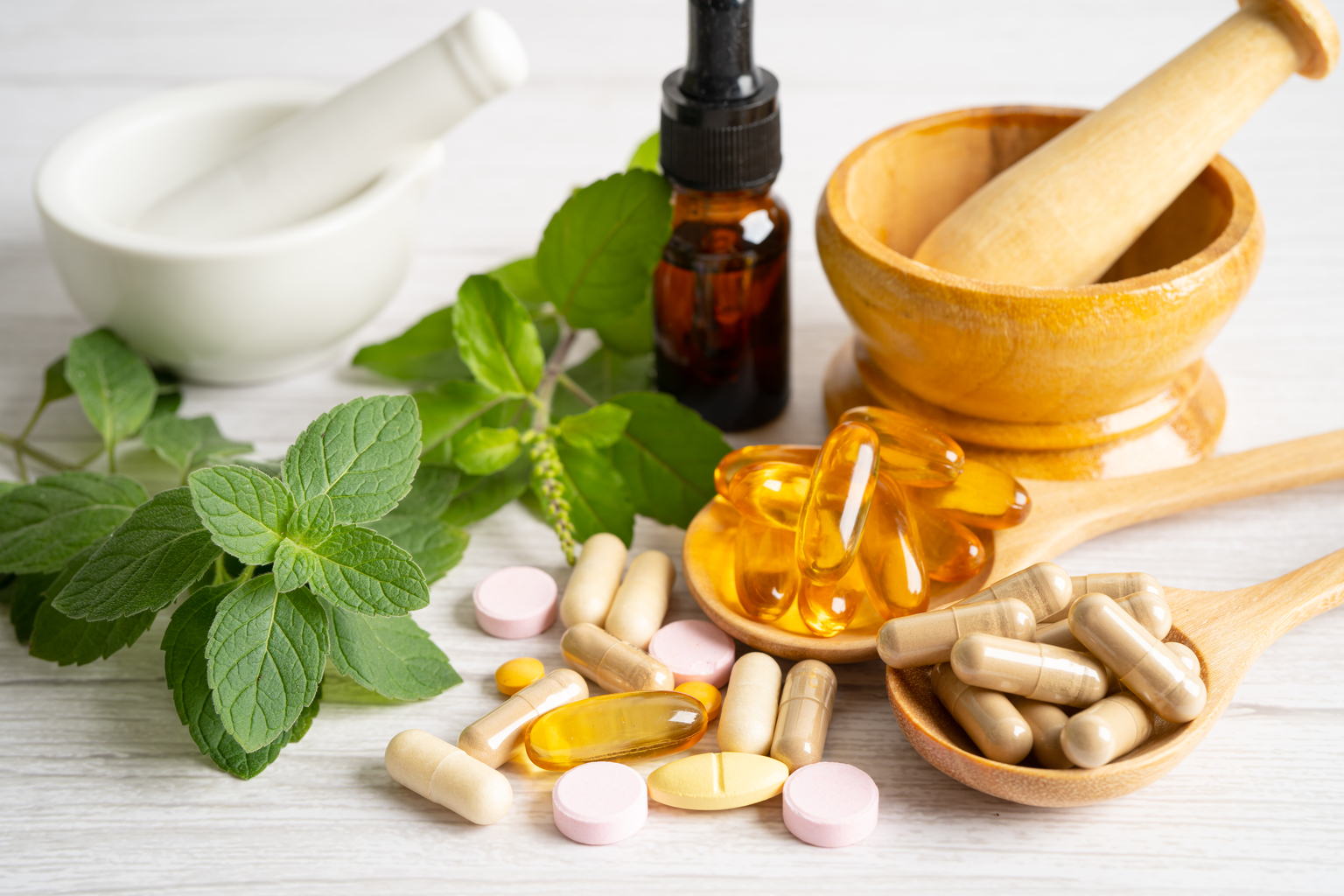 A variety of health supplements, pills, natural ingredients and oils. 